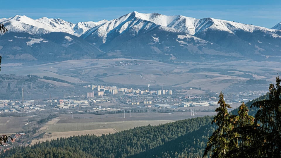 Western Tatras and Liptovsky Mikulas from Low Tatras, Slovak republic. Hiking theme. Seasonal natural scene.