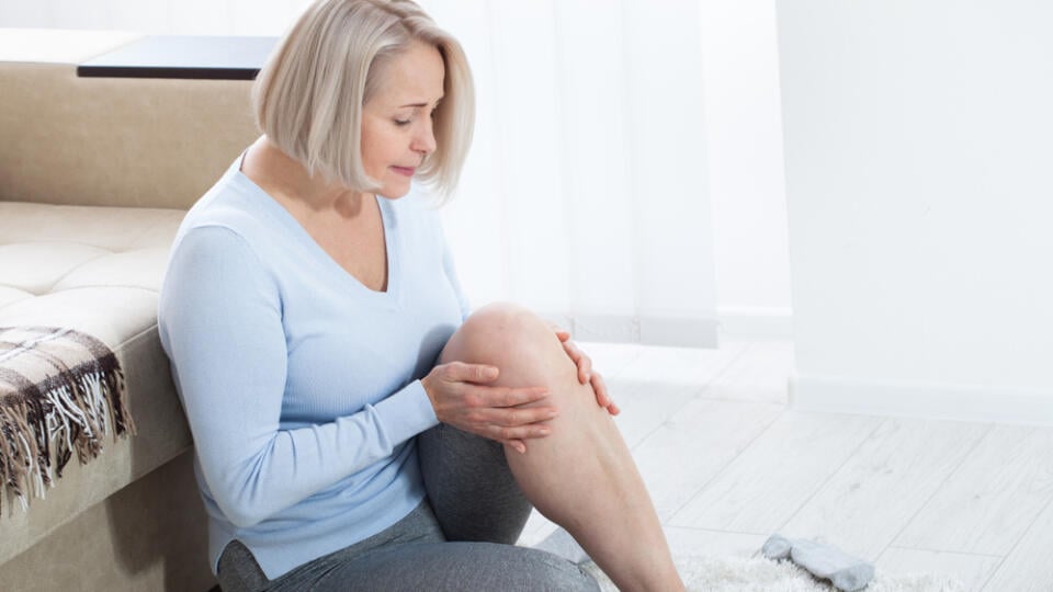 Middle-aged,Woman,Suffering,From,Pain,In,Leg,At,Home,,Closeup.