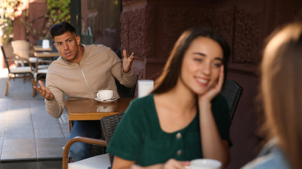 Jealous,Man,Spying,On,Ex,Girlfriend,In,Outdoor,Cafe