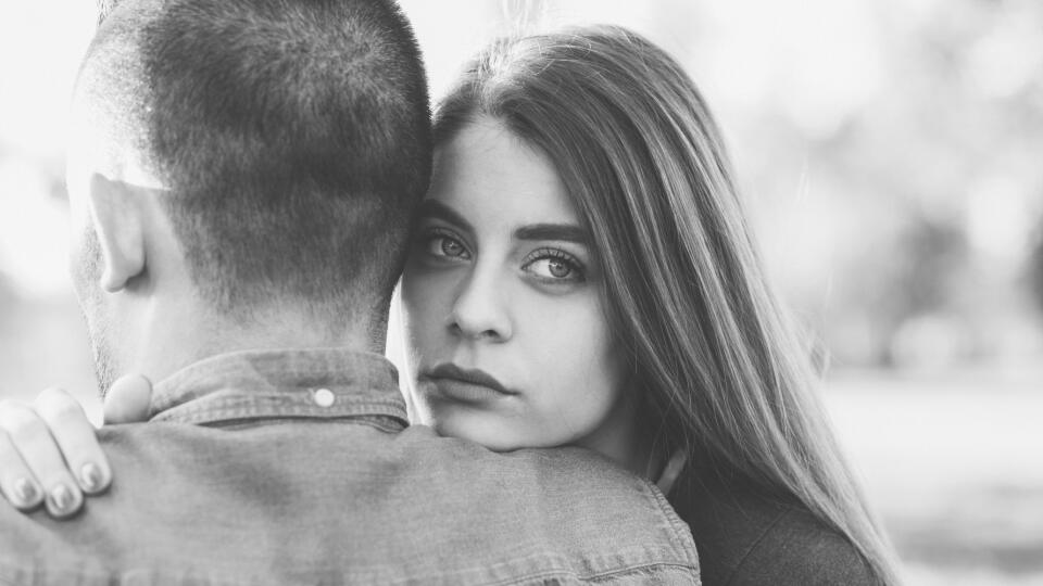 Young woman comforting unhappy friend