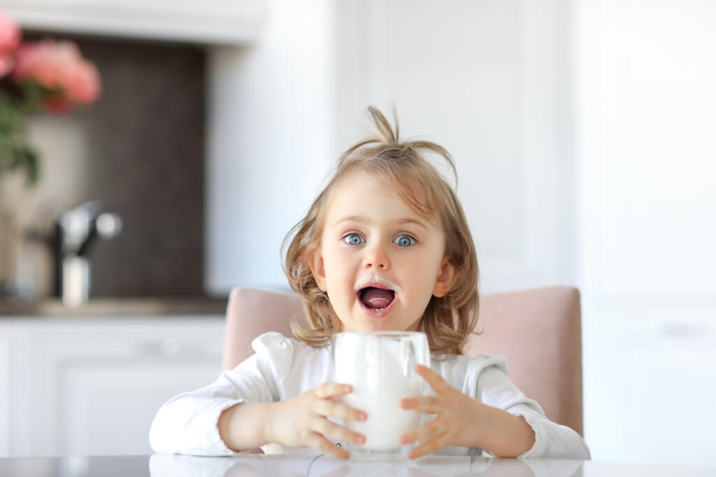 Emotional,Expression,Child,Girl,Open,Mouth,With,Mustache,Of,Milk