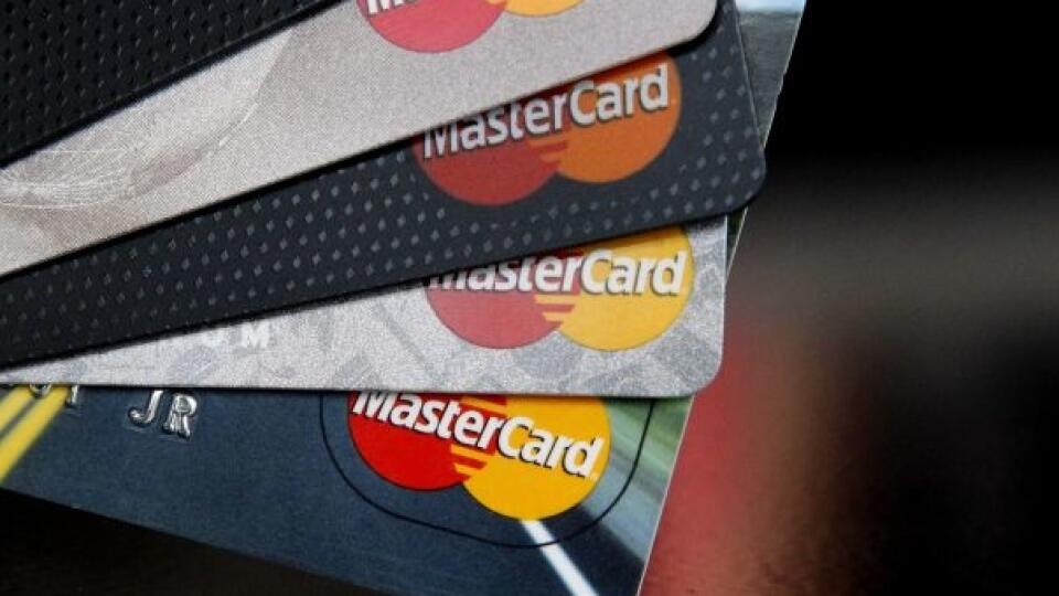 In this Thursday, April 25, 2013, photo, MasterCard credit cards are displayed for a photographer in Montpelier, Vt. MasterCard Inc. reports quarterly financial results before the market opens on Wednesday, May 1, 2013. (AP Photo/Toby Talbot)