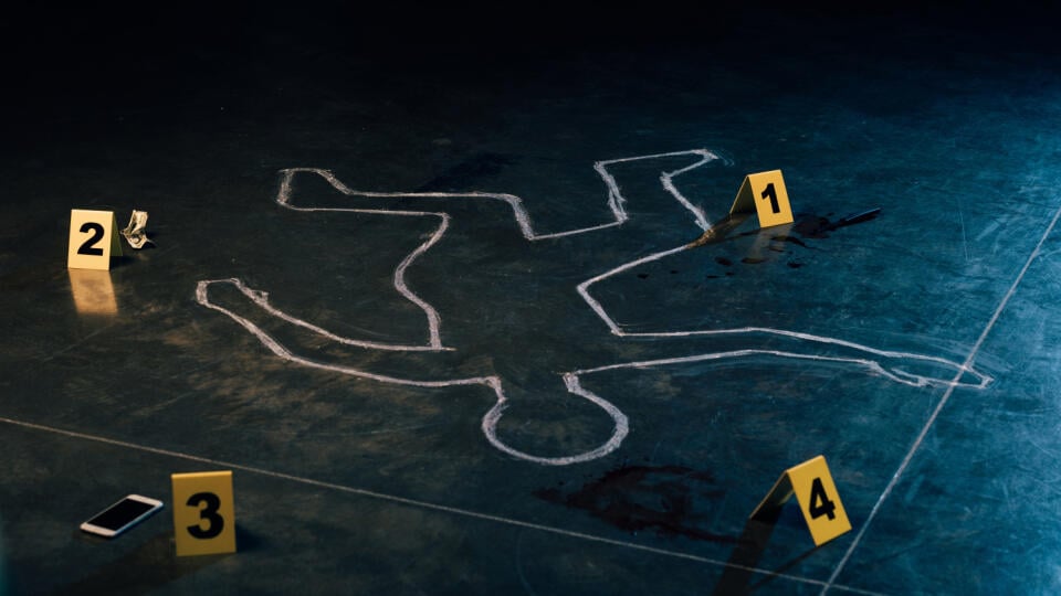 Chalk,Outline,And,Evidence,Markers,At,Crime,Scene