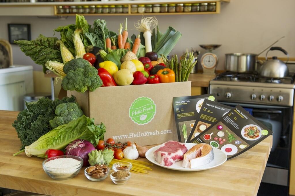 An undated photo provided by HelloFresh shows a HelloFresh dinner kit. HelloFresh, based in New York, ships ready-to-cook dinner kits to subscribers with everything needed to whip up a meal, from the raw meat and fish to vegetables and spices. Targeting busy consumers, Blue Apron and fellow startups HelloFresh and Plated are trying to make cooking at home easier and cheaper than dining out or ordering in. (AP Photo/HelloFresh)