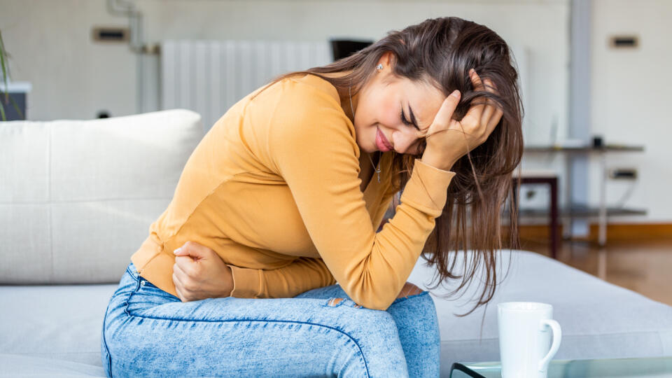 Young,Sick,Woman,With,Hands,Holding,Pressing,Her,Crotch,Lower