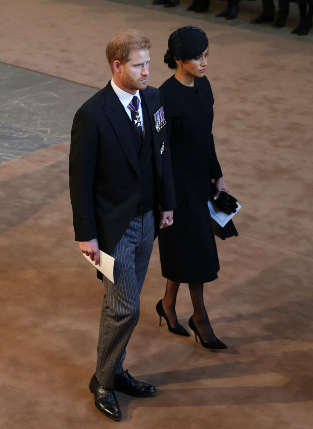 Na snímke je zobrazená Megan Markle a je manžel vojvoda zo Sussexu princ Harry.