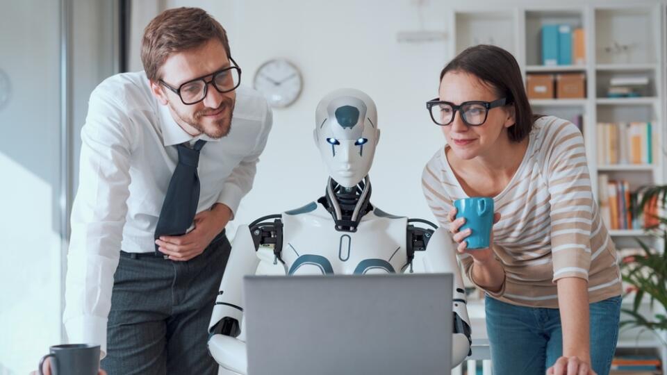Happy,Business,People,Supervising,An,Ai,Robot,Working,In,The