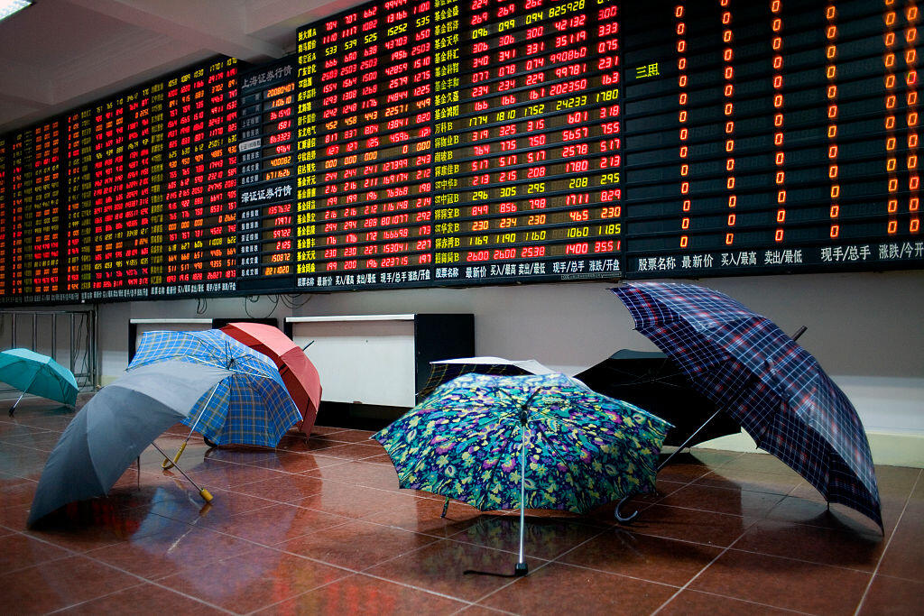 China - Shanghai - Stock Market Crash - Umbrella's Dry on the Floor