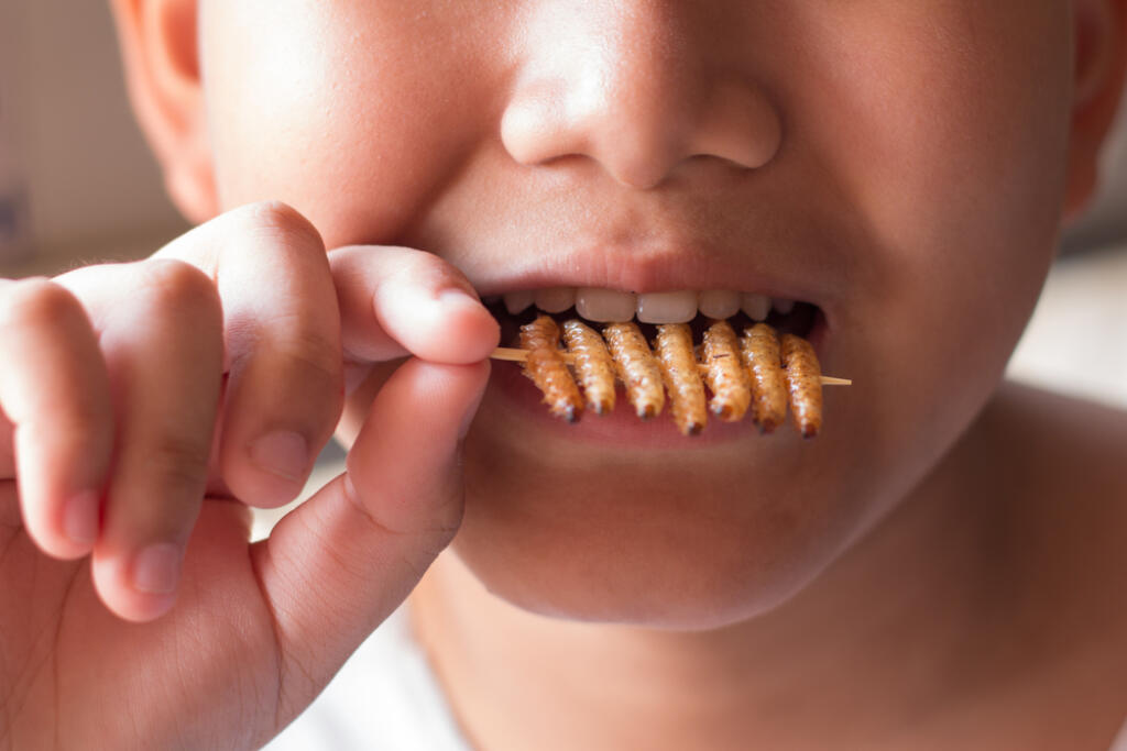 Children,Eating,Bamboo,Edible,Worm,Insects,Crispy,In,The,Skewer.
