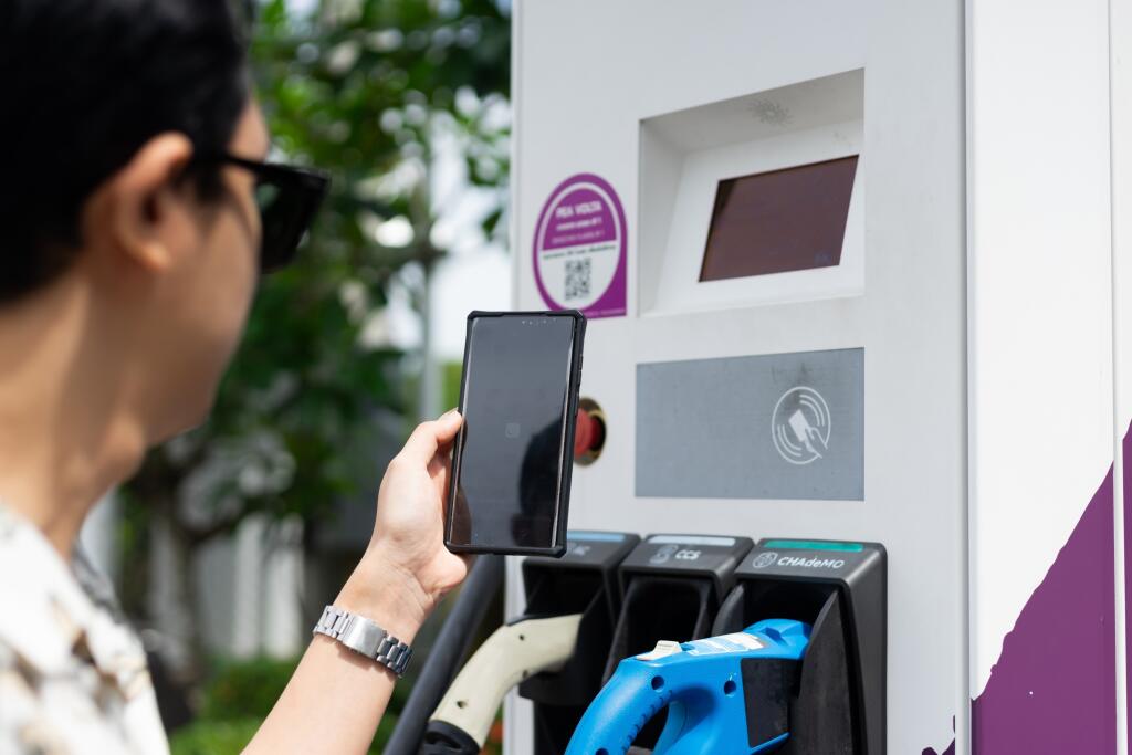 Electric,Car,Charging,At,The,Station.,Sustainability,And,Renewable,Energy
