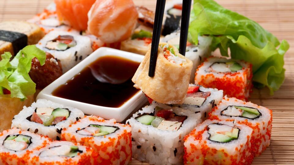 Traditional Japanese food Sushi. Closeup japanese sushi on a bamboo napkin. Sushi collection