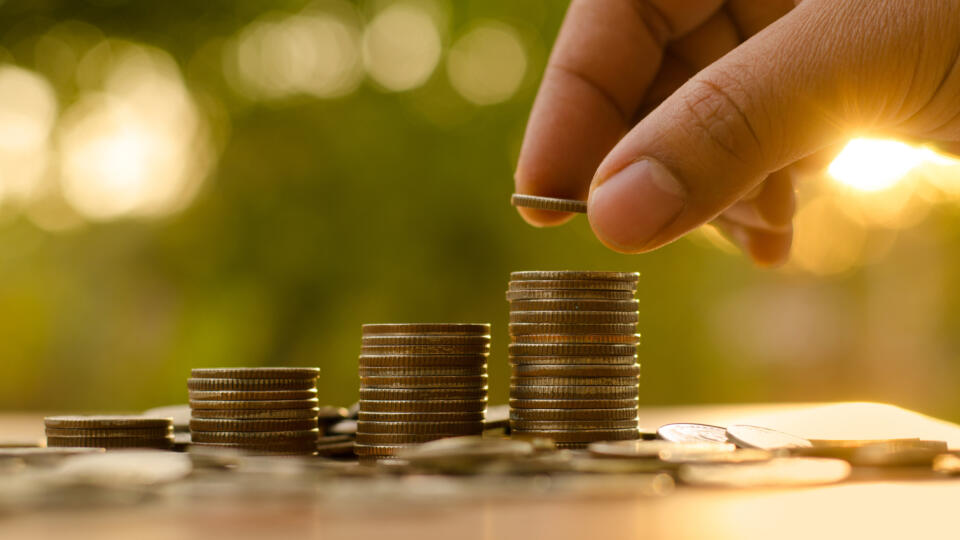 Saving,Money,Concept,Preset,By,Male,Hand,Putting,Money,Coin