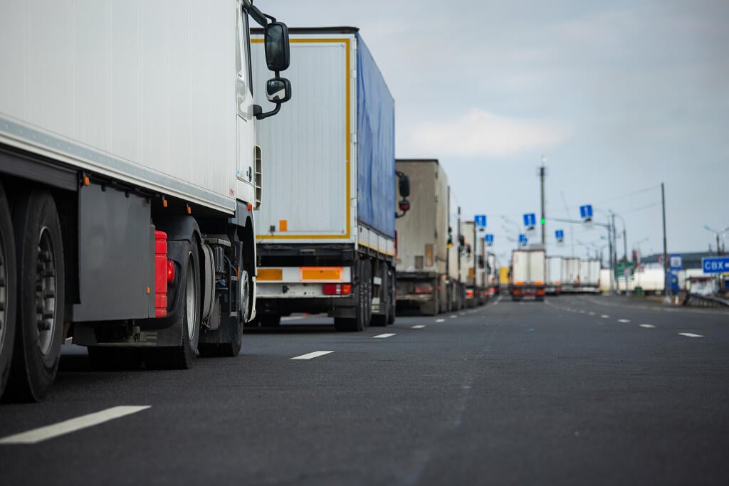 A,Long,Traffic,Jam,Of,Many,Trucks,At,The,Border