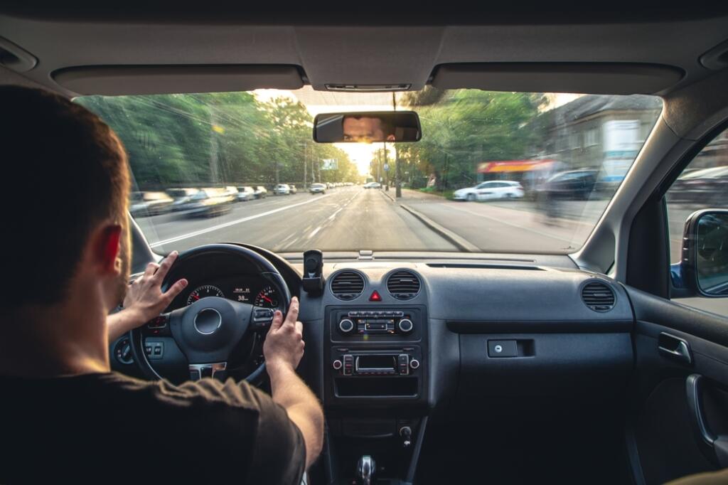 Hands,On,The,Wheel,When,Driving,At,High,Speed,From