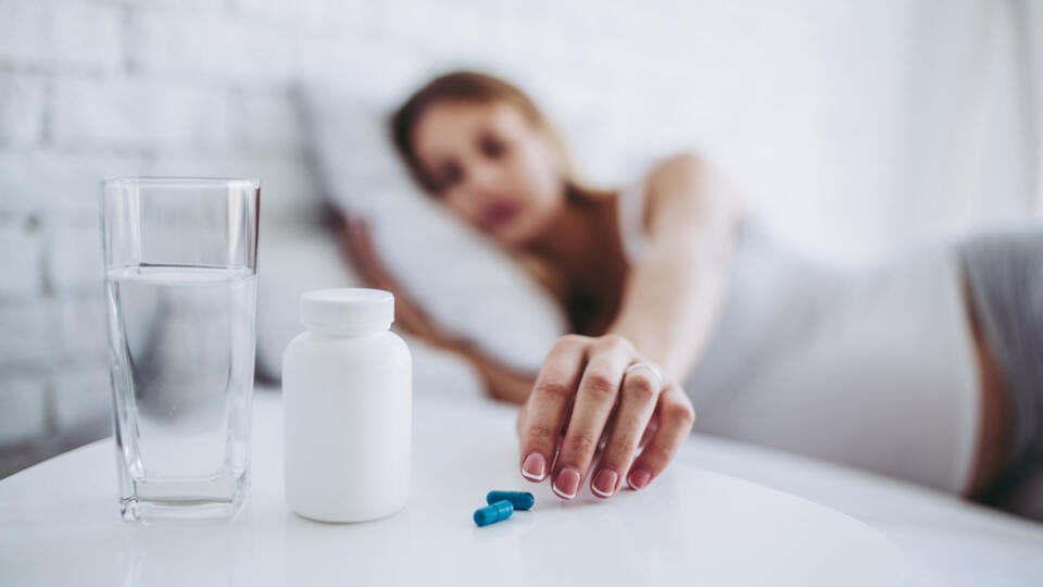 Attractive,Sick,Pregnant,Woman,Is,Lying,In,Bed.,Taking,Pills