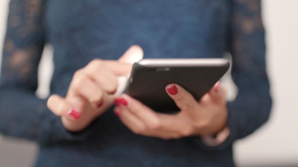 Close up of woman use of mobile phone