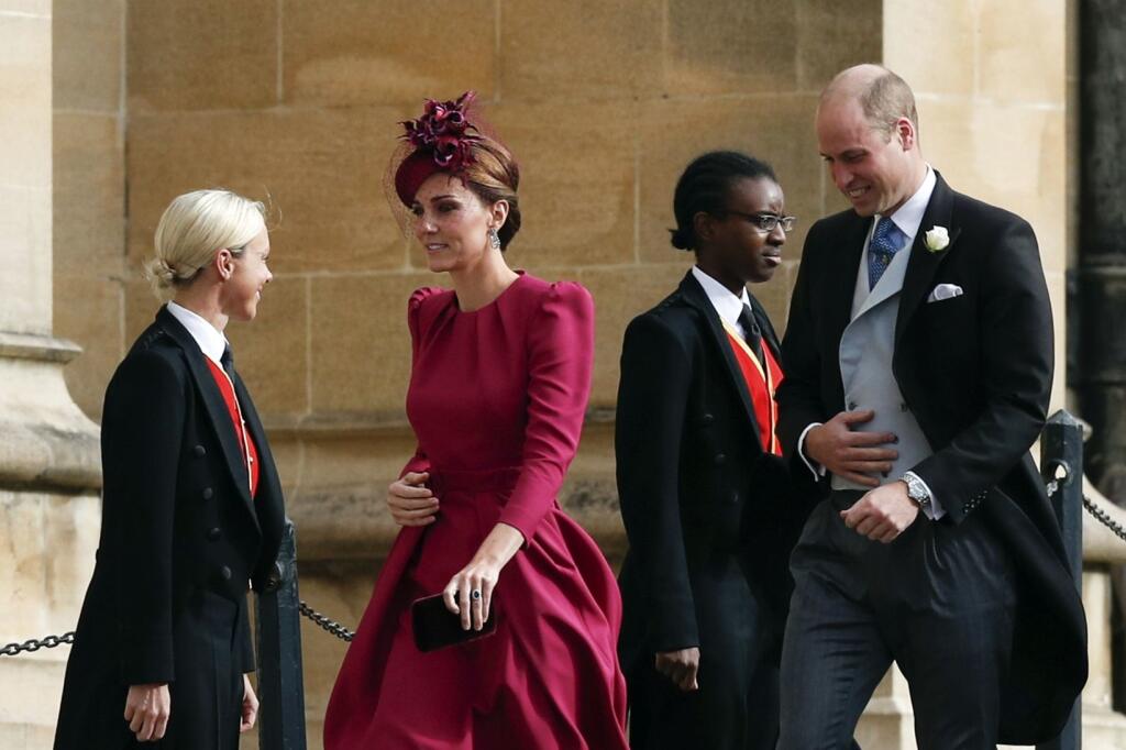 Britain's Prince William and Kate, Duchess of Cambridge arrive to attend the wedding of Princess Eugenie of York and Jack Brooksbank at St George’s Chapel, Windsor Castle, near London, England, Friday Oct. 12, 2018. (Adrian Dennis/Pool via AP)