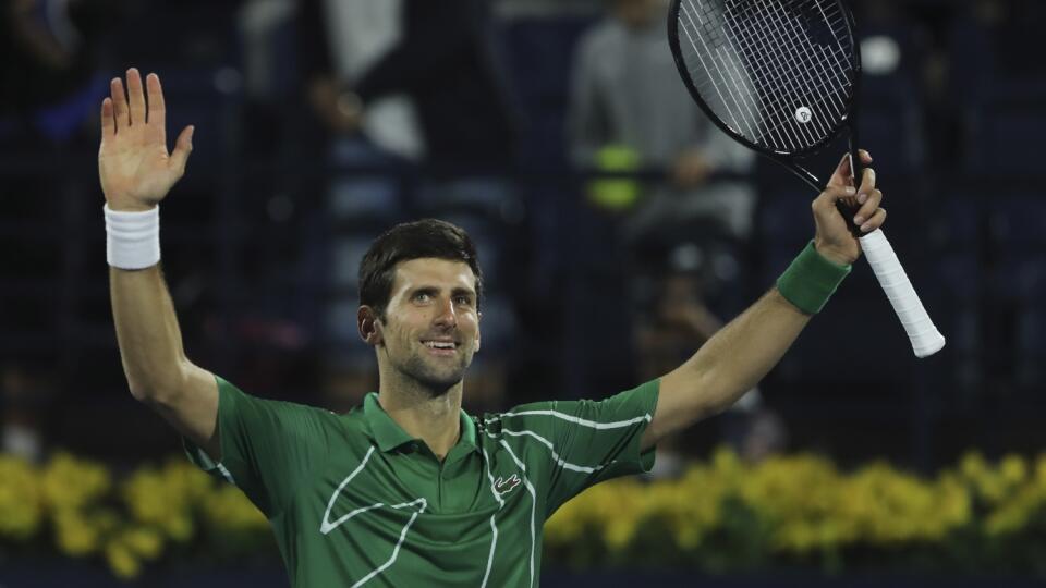 KK31 Dubaj - Srbský tenista Novak Djokovič sa teší po víťazstve nad Rusom Karenom Chačanovom vo štvrťfinále dvojhry na tenisovom turnaji ATP v Dubaji 27. februára 2020. FOTO TASR/AP
Serbia's Novak Djokovic celebrates after he beats Russia's Karen Khachanov during a quarter final match of the Dubai Duty Free Tennis Championship in Dubai, United Arab Emirates, Thursday, Feb. 27, 2020. (AP Photo/Kamran Jebreili)
