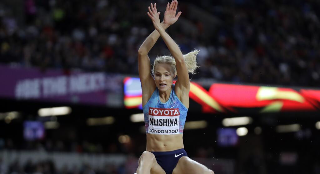 Russia's Darya Klishina makes an attempt in the women's long jump qualification during the World Athletics Championships in London Wednesday, Aug. 9, 2017. (AP Photo/Matt Dunham)