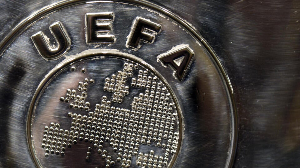 NYON, SWITZERLAND - JULY 18:  The UEFA logo is seen on the UEFA Champions League trophy as it is prepared for the UEFA 2014/15 Champions League third qualifying rounds draw at the UEFA headquarters, The House of European Football, on July 18, 2014 in Nyon, Switzerland.  (Photo by Harold Cunningham/Getty Images for UEFA)