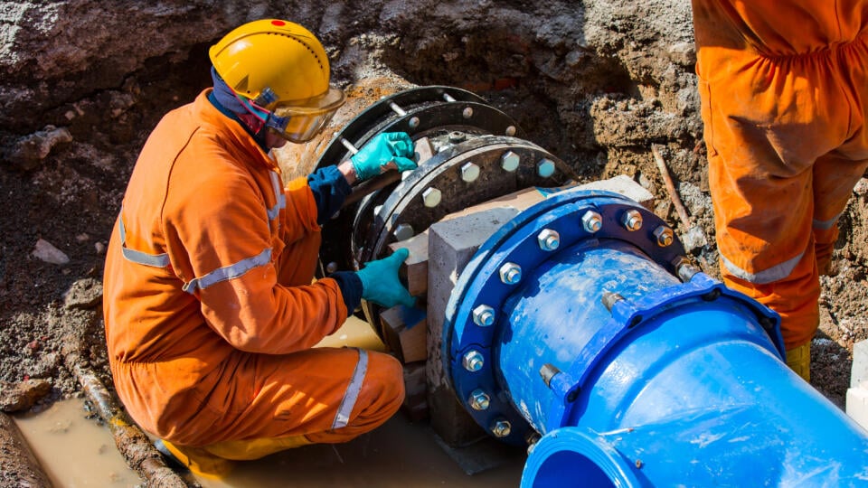 Old,Big,Drink,Water,Pipes,Joined,With,New,Blue,Valves