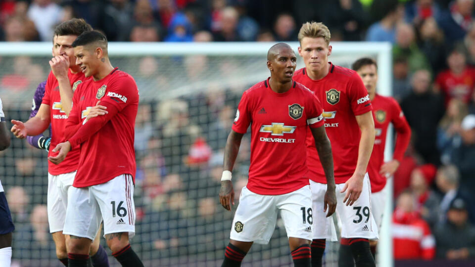 Manchester United (v červenom) sa rozišiel s Liverpoolom (v bielom) remízou 1:1.