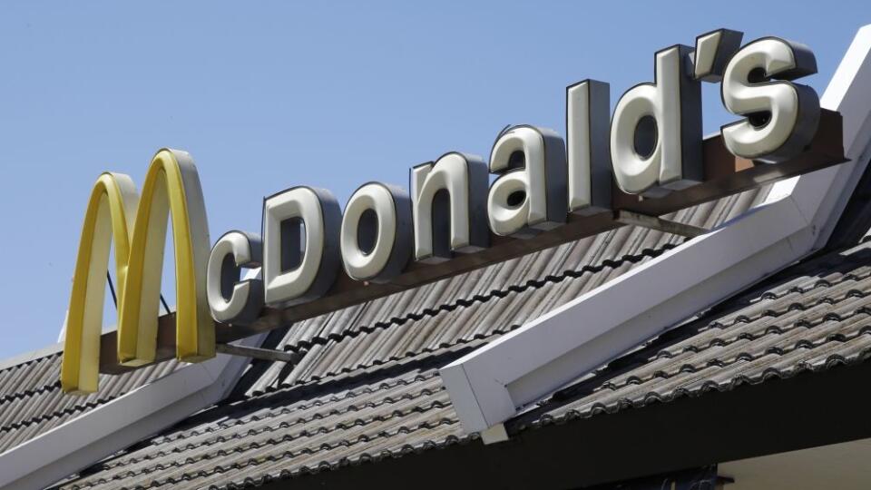 FILE - In this Friday, April 20, 2012, file photo, a McDonald's sign is shown at a McDonald's restaurant in East Palo Alto, Calif. McDonald's Corp., on Wednesday, Sept. 4, 2013, announced that a revamped version of its Dollar Menu that includes items priced at $5 could be launched nationally this year. (AP Photo/Paul Sakuma, File)