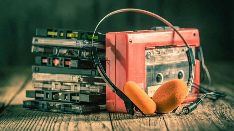 Closeup,Of,Cassette,Tape,,Red,Walkman,And,Headphones