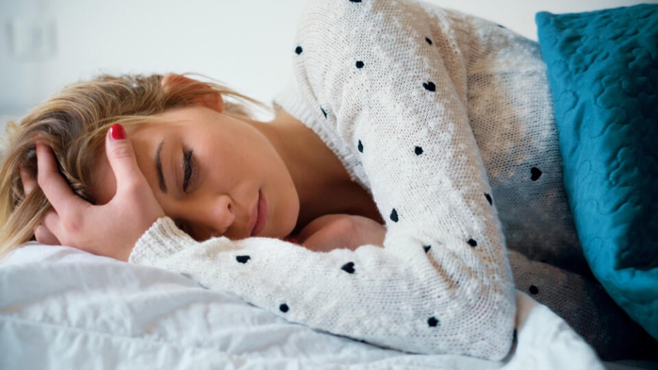 Young,Girl,Tired,And,Lying,On,The,Bed