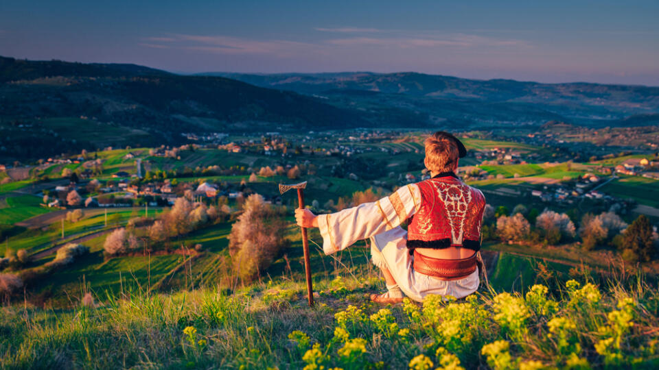 Man,In,Traditional,Slovak,Folk,Dress,Sitting,In,Spring,Nature.