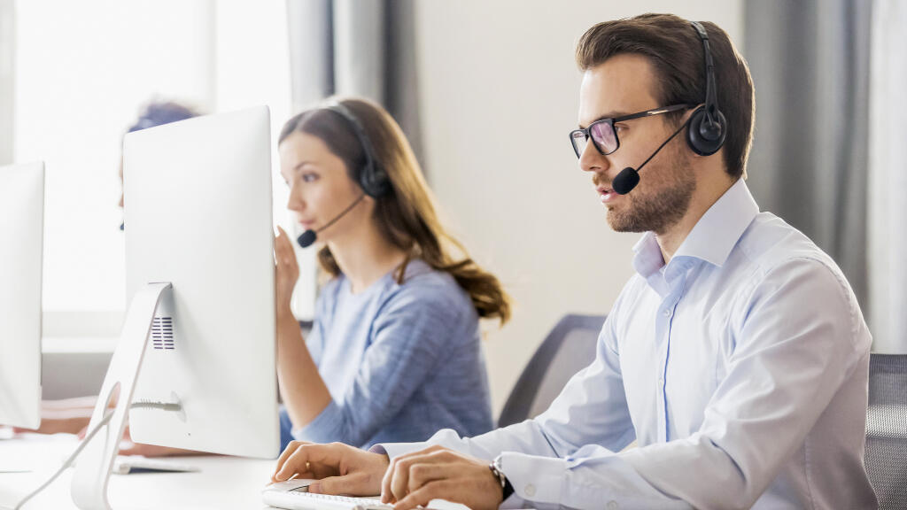 Diverse,Office,Workers,Wear,Headset,With,Microphone,Browsing,Work,On