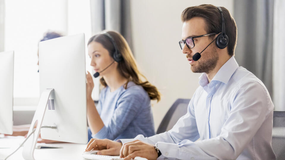 Diverse,Office,Workers,Wear,Headset,With,Microphone,Browsing,Work,On