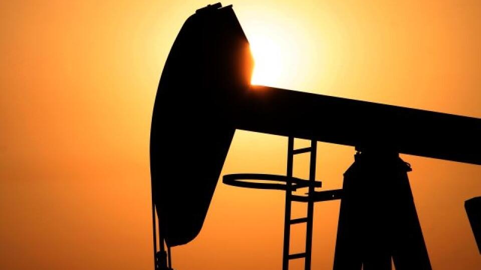 An oil pump works at sunset Wednesday, June 8, 2011, in the desert oil fields of Sakhir, Bahrain. OPEC unexpectedly left its production levels unchanged on Wednesday, causing oil prices to jump, as senior officials said their meeting ended in disarray - a stunning admission for an organization that places a premium on consensus decision making. (AP Photo/Hasan Jamali)