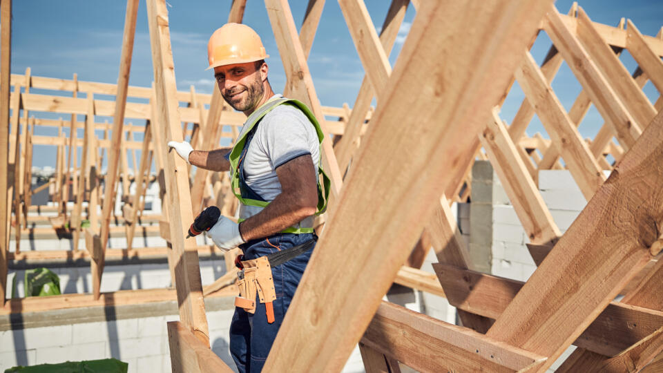 Smiley,Male,Builder,Wearing,A,Hard,Hat,And,Working,With