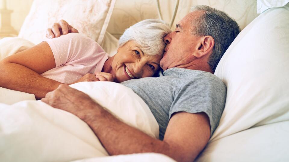 Cropped shot of a senior couple being affectionate in their bedroom