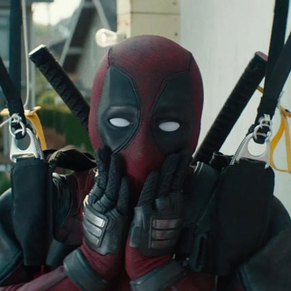 Ryan Reynolds ako Deadpool.