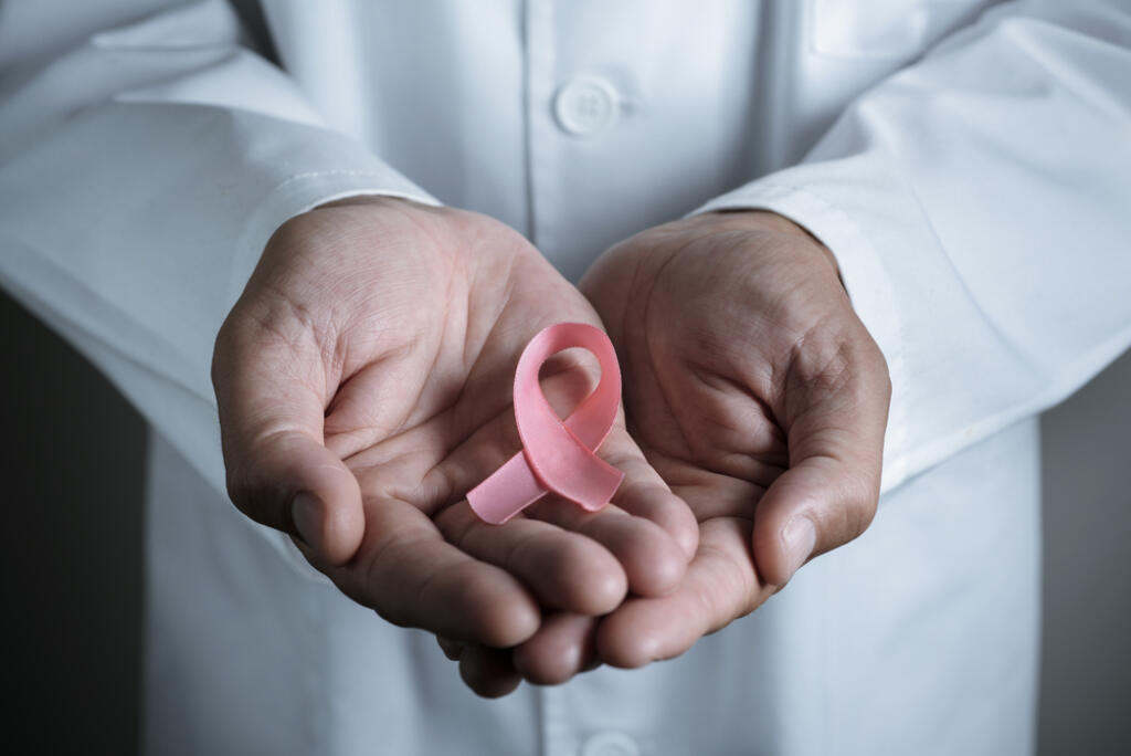 Closeup,Of,A,Young,Caucasian,Doctor,Man,With,A,Pink