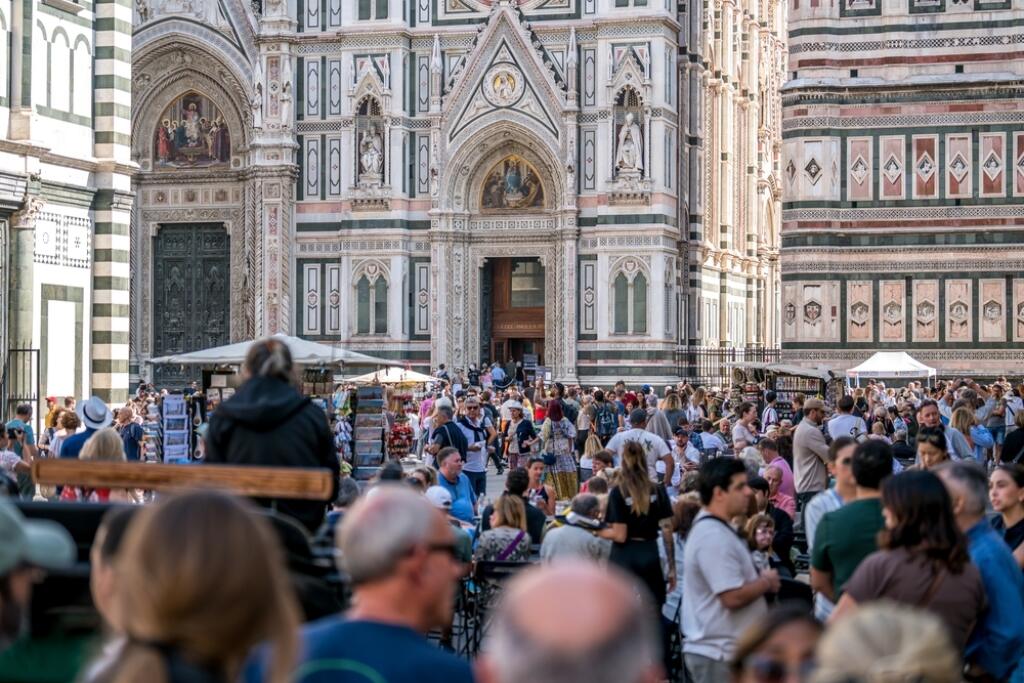 09.24.2024 Italy, Florence - Tourists crowding at Piazza del Duomo - in front of Florence cathedral