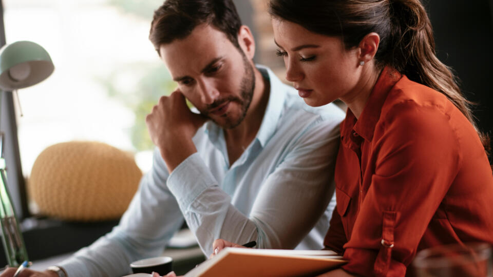 Colleagues,In,Office.,Businesswoman,And,Businessman,Discussing,Work,In,Office.