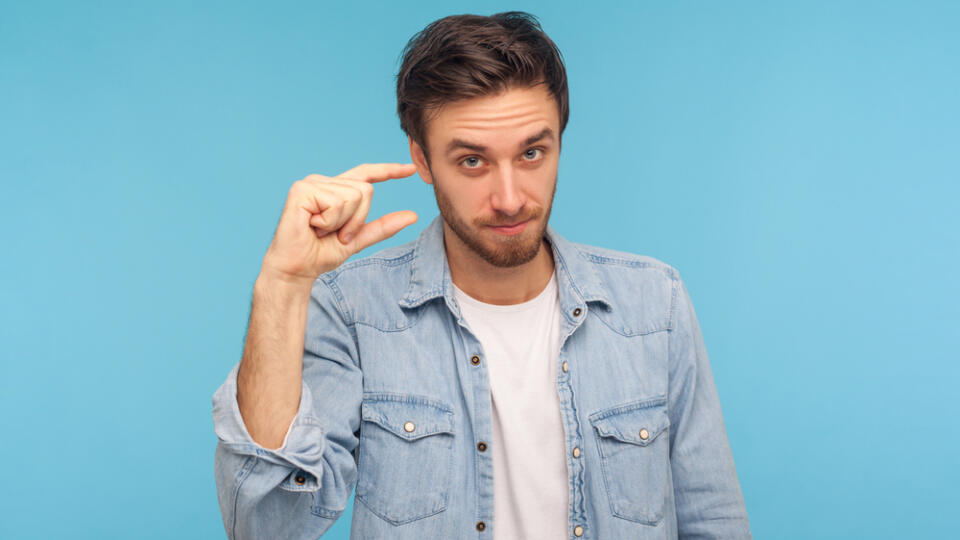 Too,Small,Amount!,Portrait,Of,Disappointed,Man,In,Worker,Denim