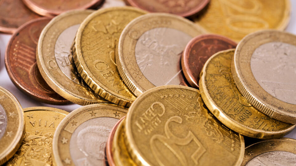 Money,Laundering,On,Clothesline,On,Light,Background.,Handful,Of,Coins.