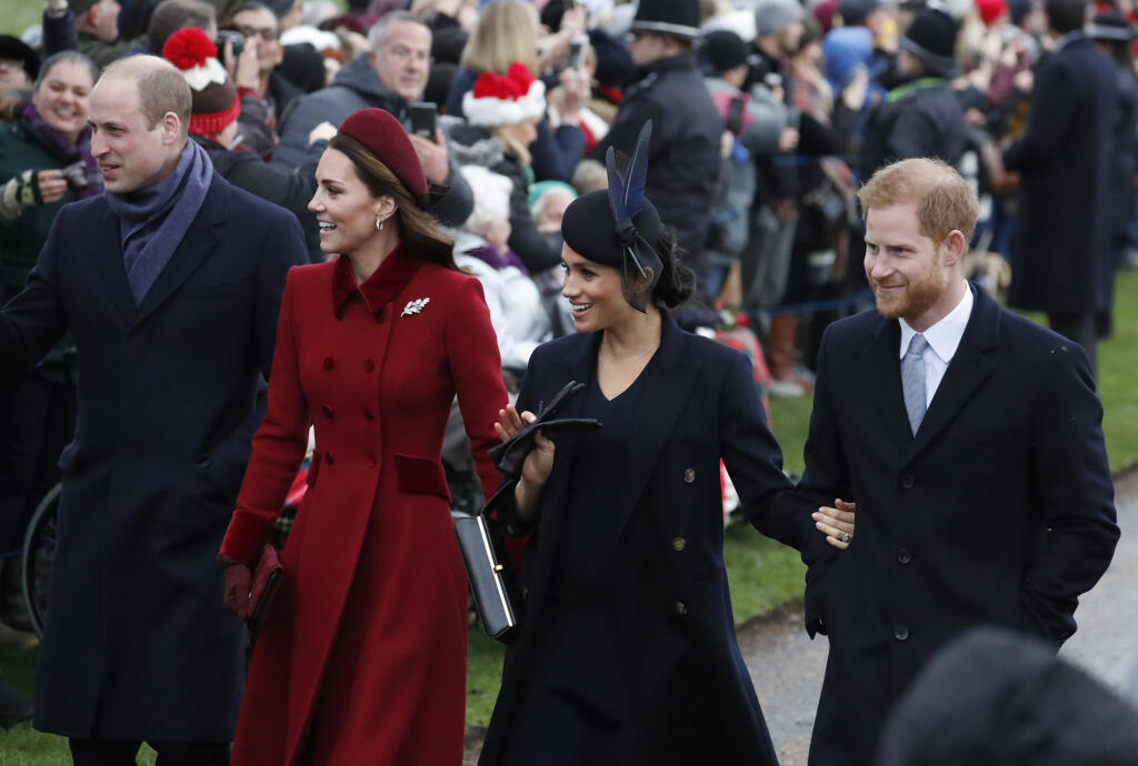Britain's Prince William, left, Kate, Duchess of Cambridge, second left, Meghan Duchess of Sussex and Prince Harry, right, arrive to attend the Christmas day service at St Mary Magdalene Church in Sandringham in Norfolk, England, Tuesday, Dec. 25, 2018. (AP PhotoFrank Augstein)