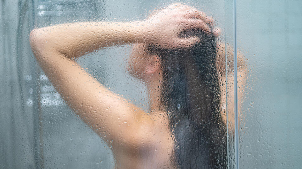 Unfocused,Naked,Woman,Showering,,Bathing,And,Washing,Long,Hair,In