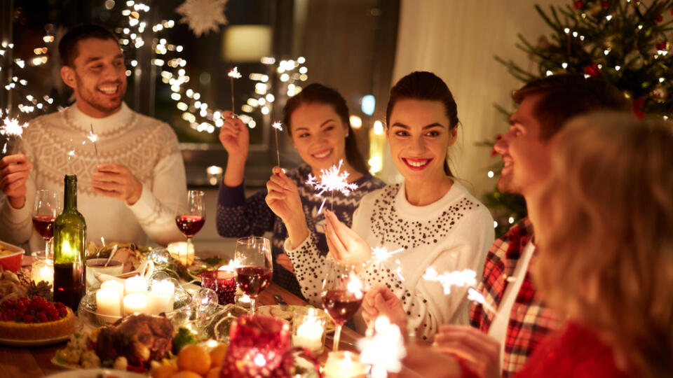 Winter,Holidays,And,People,Concept,-,Happy,Friends,With,Sparklers