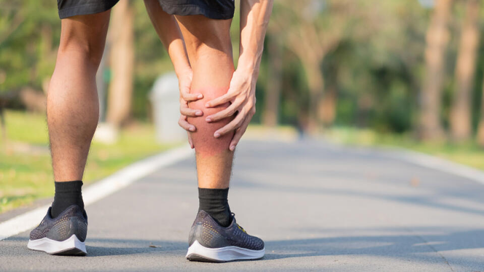 Young,Fitness,Man,Holding,His,Sports,Leg,Injury.,Muscle,Painful