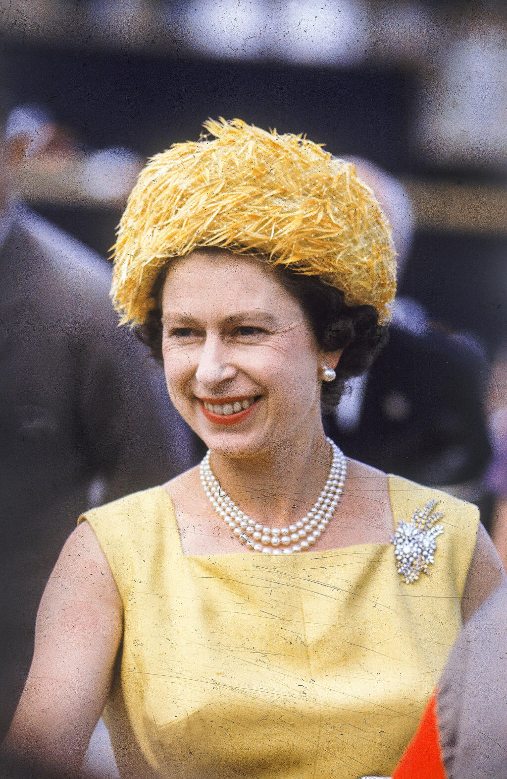 Queen Elizabeth II looking radiant in yellow while in St. Kitts during a five week tour of the West Indies in 1966. Date: 1966,Image: 118978041, License: Rights-managed, Restrictions: , Model Release: no