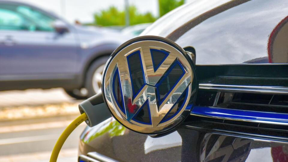 A Volkswagen Golf GTE is charged at a charging station