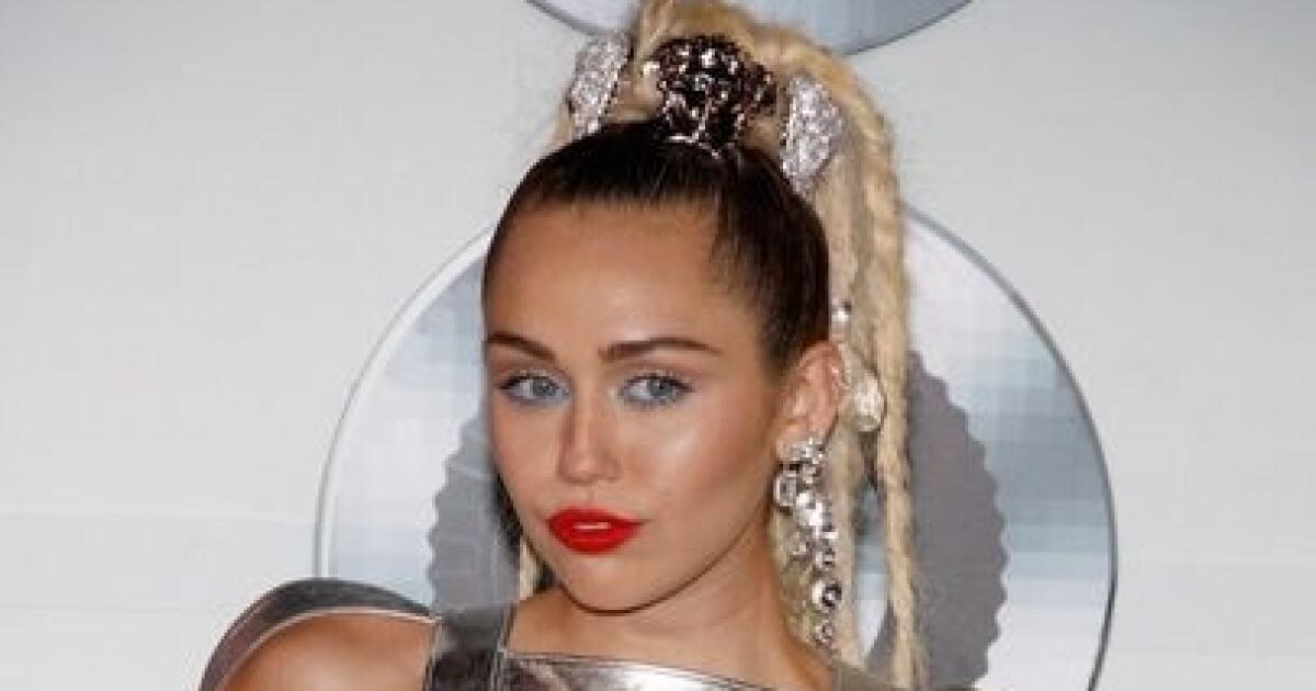 Miley Cyrus Shows Off Bleached Eyebrows, Cuddles With Her 