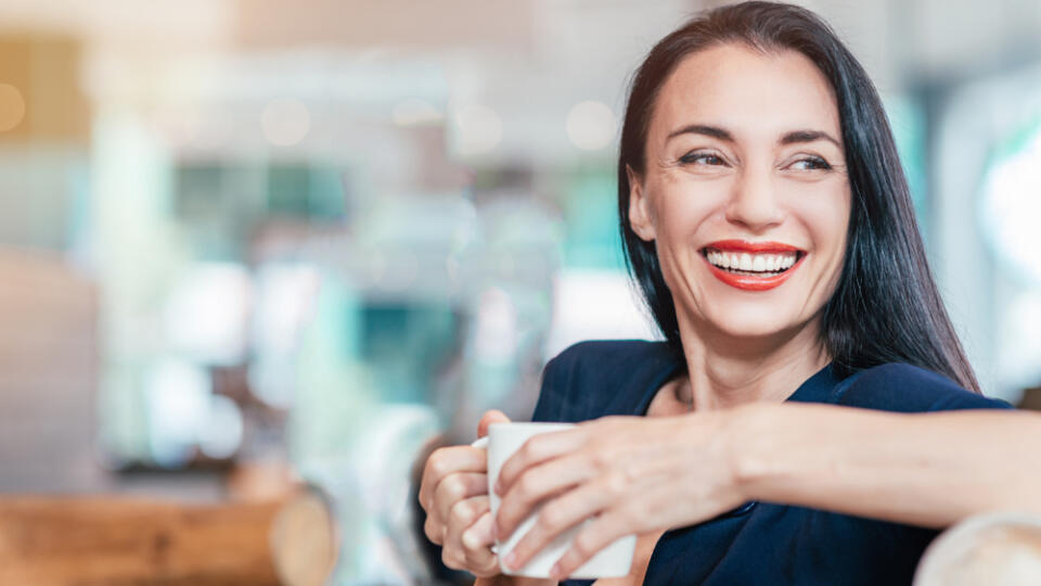 Close,Up,Portrait,Of,Mature,Woman,Sitting,In,A,Chair