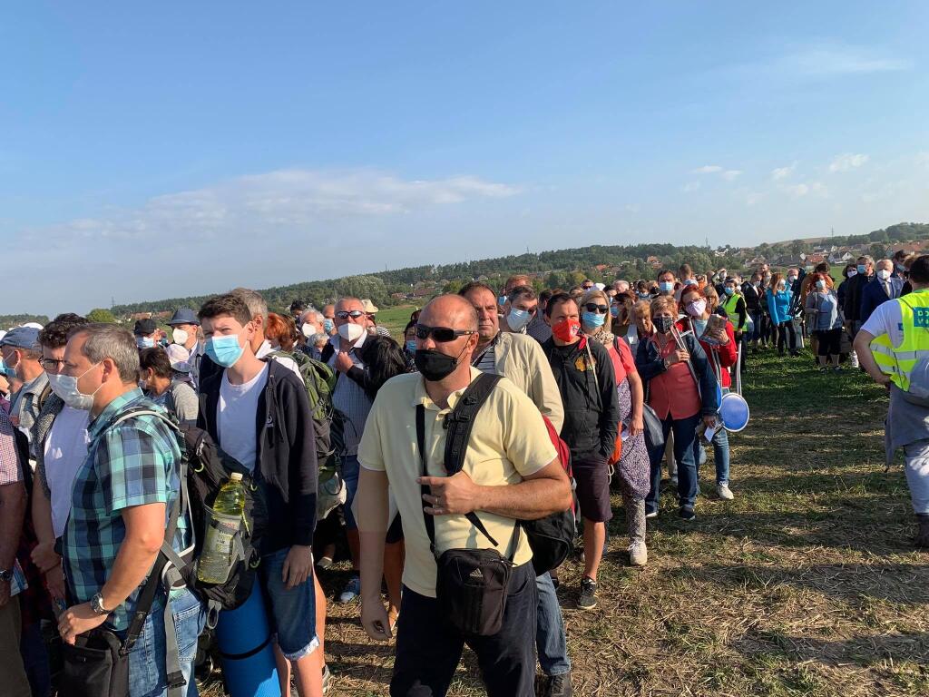 A few minutes before the gates to the individual sectors in Šaštín are closed, people stand in long lines.